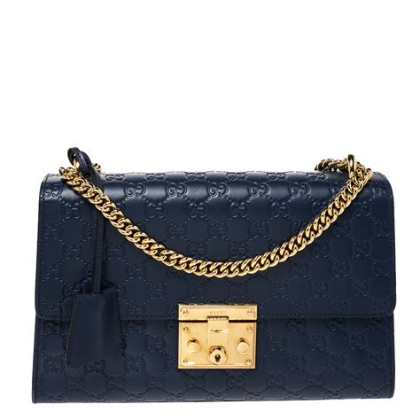 navy blue Gucci bag